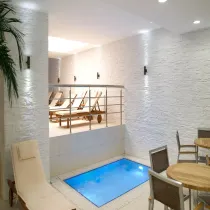 Beyaz Patlatma Dokulu Kapalı Havuz ve SPA Duvar Kaplaması
